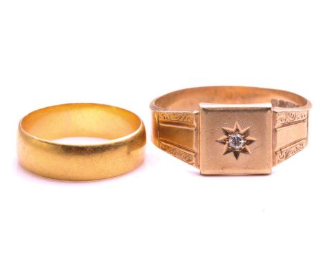 A 22ct gold wedding band and a 9ct gold signet ring; the wedding band is composed of a plain D-section band, Birmingham hallm