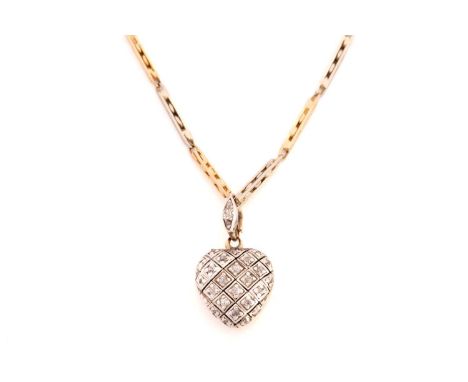 A diamond-set heart locket on a watch chain, the cover of the heart-shaped locket is set with old-cut diamonds throughout on 