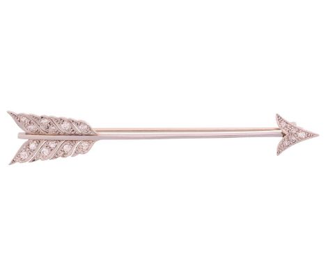 A diamond bar brooch in the form of an arrow, the point and fletching encrusted with single-cut diamonds and millgrain detail