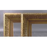 A PAIR OF LARGE GILTWOOD AND GESSO FRAMES rebate size 34.5" X 49" (88cm x 124.5cm)