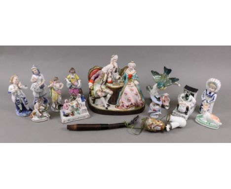 A coloured bisque group, The Chess Players, late 19th century, a Bavarian pipe with porcelain bowl and a collection of eleven