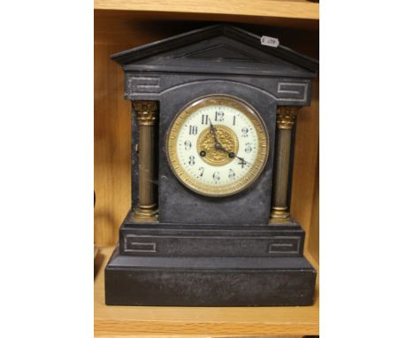 A MARBLE MANTEL CLOCK (HEAVY)
