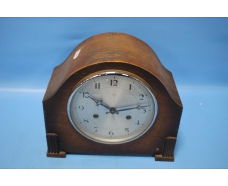 AN OAK 'ANVIL' MANTEL CLOCK