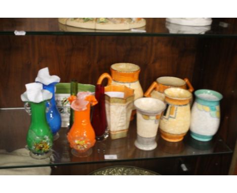 A COLLECTION OF CERAMIC VASES TOGETHER WITH A SMALL COLLECTION OF COLOURED GLASS VASESCondition Report: One of the smaller or
