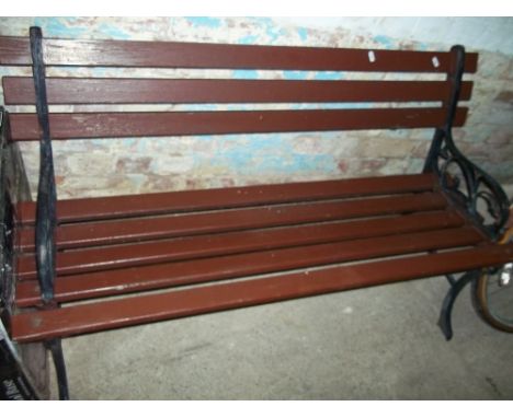 A CAST IRON GARDEN BENCH