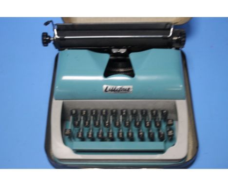 A CASED LILLIPUT TYPEWRITER