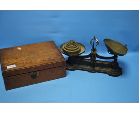 A SET OF AVERY SCALES AND WEIGHTS AND A WRITING SLOPE