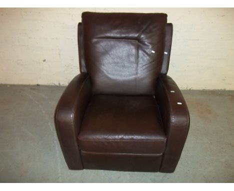 A BROWN LEATHER MANUAL RECLINER CHAIR.