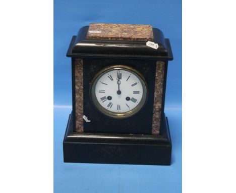 A SLATE MANTEL CLOCKCondition Report:  The pendulum is present and the key.  The case has minor edge chips but no cracks we c
