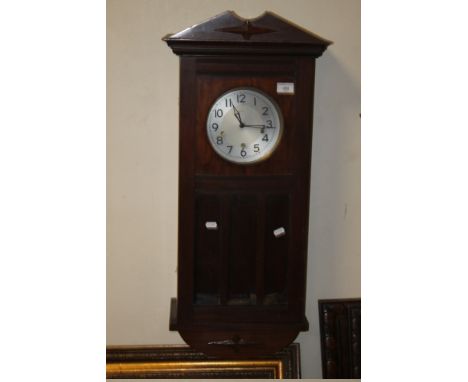 AN ENFIELD HANGING WALL CLOCK