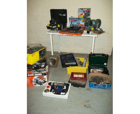 A QUANTITY OF BOXED POWER TOOLS AND A BENCH GRINDER