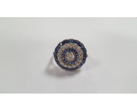 A PLATINUM SAPPHIRE AND DIAMOND RING, DIAMONDS APPROX. 0.78 CT, CALIBRE CUT SAPPHIRES APPROX. 2.35 CT,&nbsp;SIZE O½