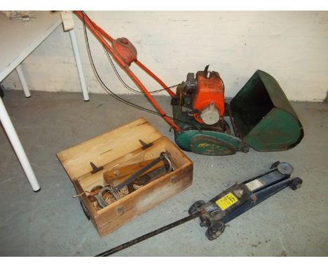 A SUFFOLK COLT PETROL LAWN MOWER, A CAR JACK, A WOODEN LOCKING TOOLBOX AND CONTENTS