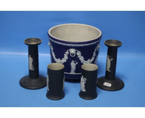 A COLLECTION OF WEDGWOOD JASPERWARE MAINLY BLACKCondition Report: The jardiniere is a darker blue. It has an old rust stain t