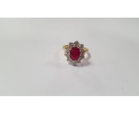 AN 18 CT YELLOW GOLD OVAL-CUT RUBY AND RBC DIAMOND CLUSTER RING, RUBY 2.25 CT, DIAMONDS 1.50 CT