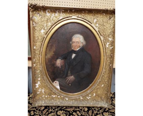 A 19thC oil on canvas portrait of a seated gentleman set into a gilt gesso frame having ornately carved and applied foliate s
