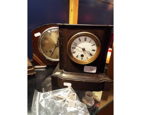 A late 19thC faux slate mantel clock with white enamel dial and Roman numerals together with a Garrard Art Deco oak cased man