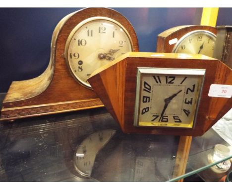 A French walnut cased Art Deco mantle clock together with an oak case Napoleon hat shaped mantel clock with silvered dial and