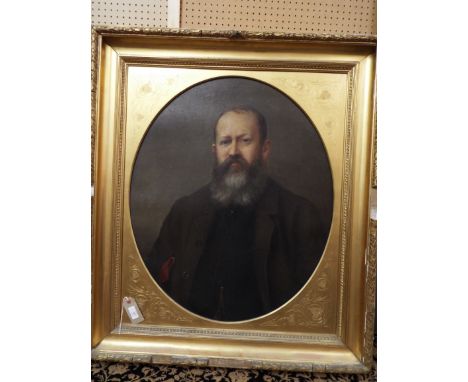 A large late 19thC oil on canvas portrait of a bearded gentleman, set into a gilt gesso frame with engraved foliate detail to