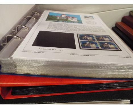 Four albums of Swiss and Liechtenstein first day covers