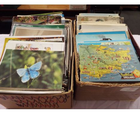 Two boxes of assorted postcards to include architectural, scenic etc 