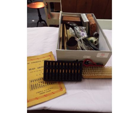 A mixed selection of items to include miniature abacus, silver topped ceramic scent bottle, German wooden egg cups, playing c