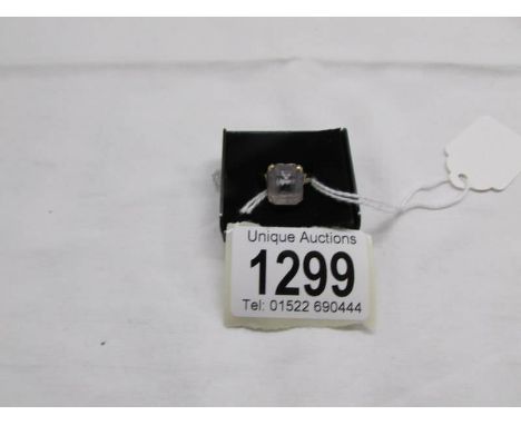 A 9ct yellow gold square topaz ring, size N.