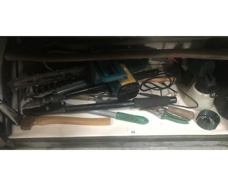A collection of gardening hand tools with an electric chainsaw &amp; electric spray painter