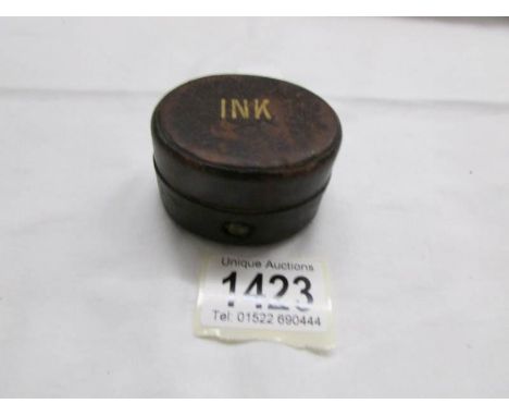 A Victorian travelling inkwell.