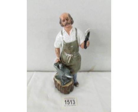 A Royal Doulton figurine 'The Blacksmith', designed by William K Kaufer, HN2782.