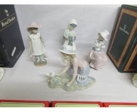 4 NAO figurines including girl with dog, girl with rabbit etc.,