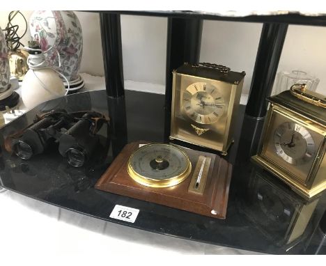 A pair of binoculars (A/F), 2 carriage clocks and a barometer