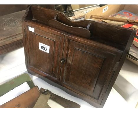 A pipe smokers cabinet