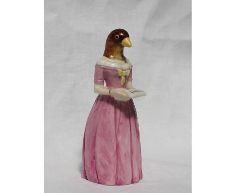 A Royal Worcester candle snuffer Diffidence, modelled as a caricature of Jenny Lind wearing a pink dress, puce mark and date 