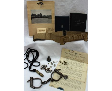 Assorted items relating to The Palestine Police Force including a manual, note book, 1949 calendar, other ephemera, Hiatt han