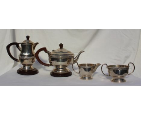 A late Victorian four piece teaset, comprising a teapot, hot water jug, cream jug and sugar basin, Birmingham, 1898, approxim
