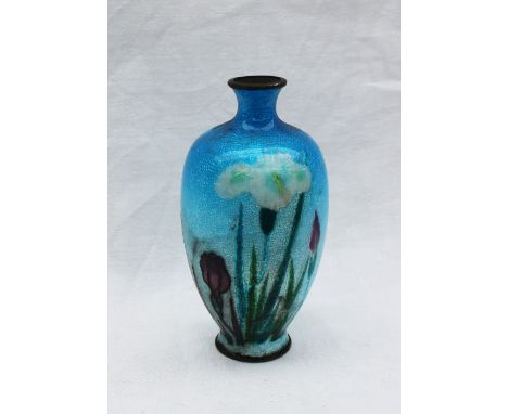 A Japanese enamel vase decorated with flowers to a light blue ground, 9cm high 