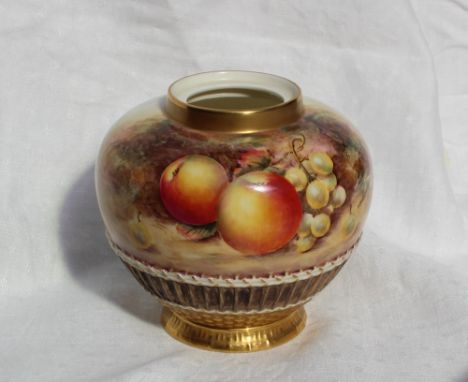 A Royal Worcester fruit painted bone china pot pouri vase, of ovoid shape with a basket weave base painted with apples and gr