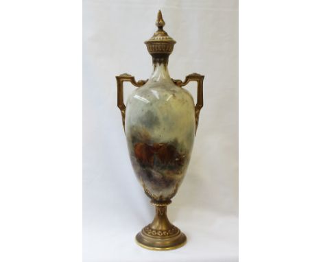 A Royal Worcester porcelain twin handled vase and cover, the domed cover with a flame finial above angular twin handles and a