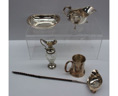A late George III silver and horn handled coin inset ladle, London, 1813, together with a silver sauce boat, silver christeni