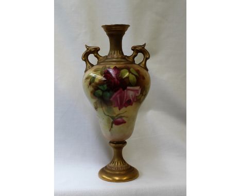 A Royal Worcester porcelain twin handled single stem vase painted with roses to an ivory ground signed F Harper, puce mark, N