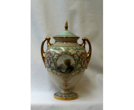 A Royal Worcester porcelain twin handled vase and cover, the domed cover with a gilt flame finial and gilt scrolls, the body 
