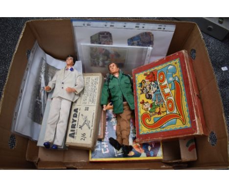 A box of mixed toys and games including 1960's Palitoys Action Man, Rosebud dollin original box, jigsaws, Lotto etc