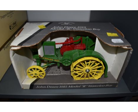 A Ertl diecast 1:16 scale John Deere 1915 Model R Waterloo Boy Tractor, No 559,  in original display box