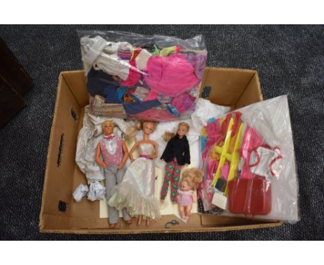 Four 1960's and later Mattel Barbie Dolls, Barbie 1966, Ken 1968, Teenager 1967 and Baby 1976 with a collection of clothes an
