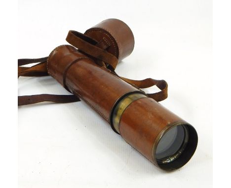 A brass leather covered three draw telescope&nbsp;inscribed "Reconditioned for John Barker and Co Ltd, Kensington W8 byt Broa