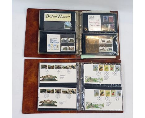 Two albums of GB presentation packs and some First Day Covers