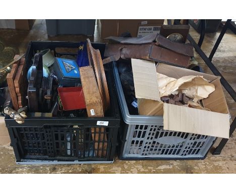 Two boxes of assorted items to include barometer, African figures, bellows, etc