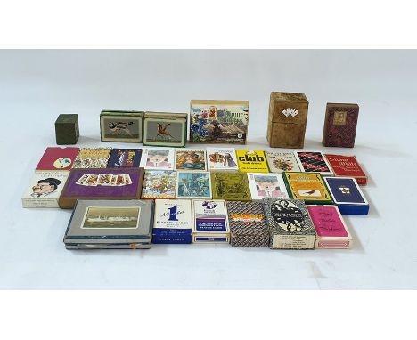 A collection of boxed playing cards, card games, dominoes, a tin case set of patience and an Italy white and red resin chess 