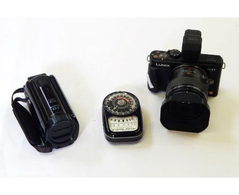 Lumix Panasonic DMC-GX1 camera, a Canon Legria HFR606 hand-held video camera and a Weston Master III universal exposure meter